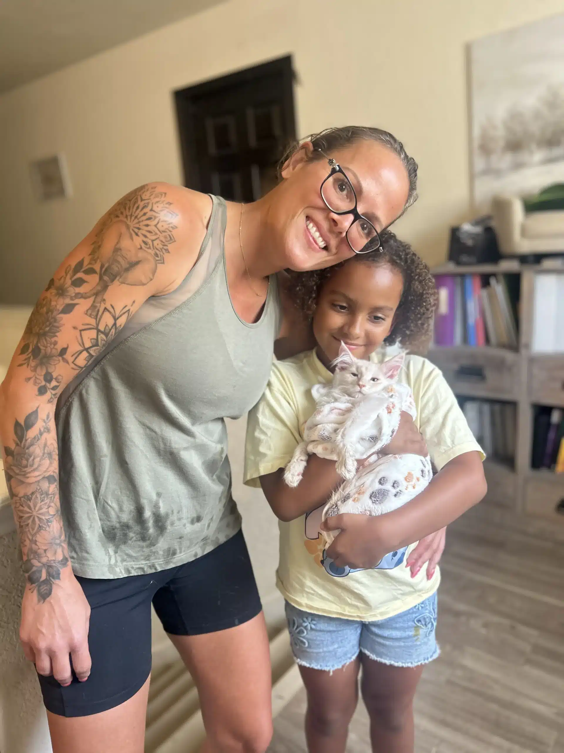 Family Picking Up a Maine Coon Kitten in San Antonio