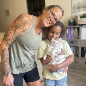 Family picking up a maine coon kitten in san antonio